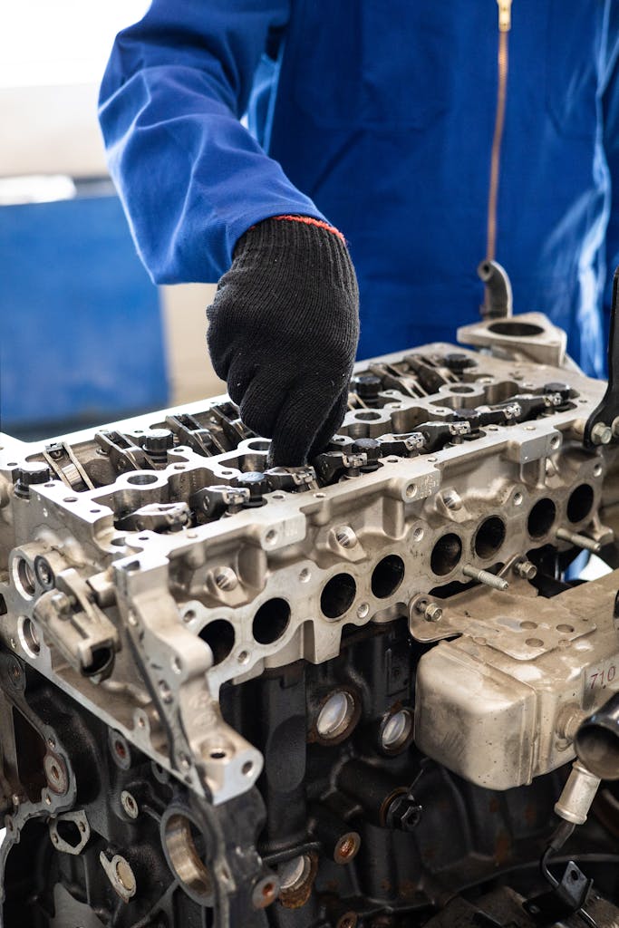 Man Repairing an Engine